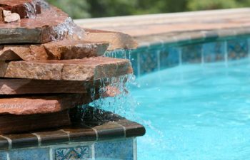 swimming pool with a built-in waterfall