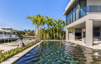 a modern building with an outdoor swimming pool